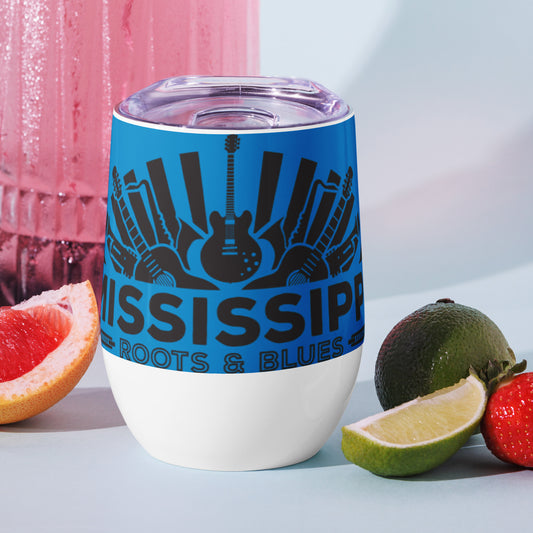 wine cup with blues logo and blue background sitting among fruit slices