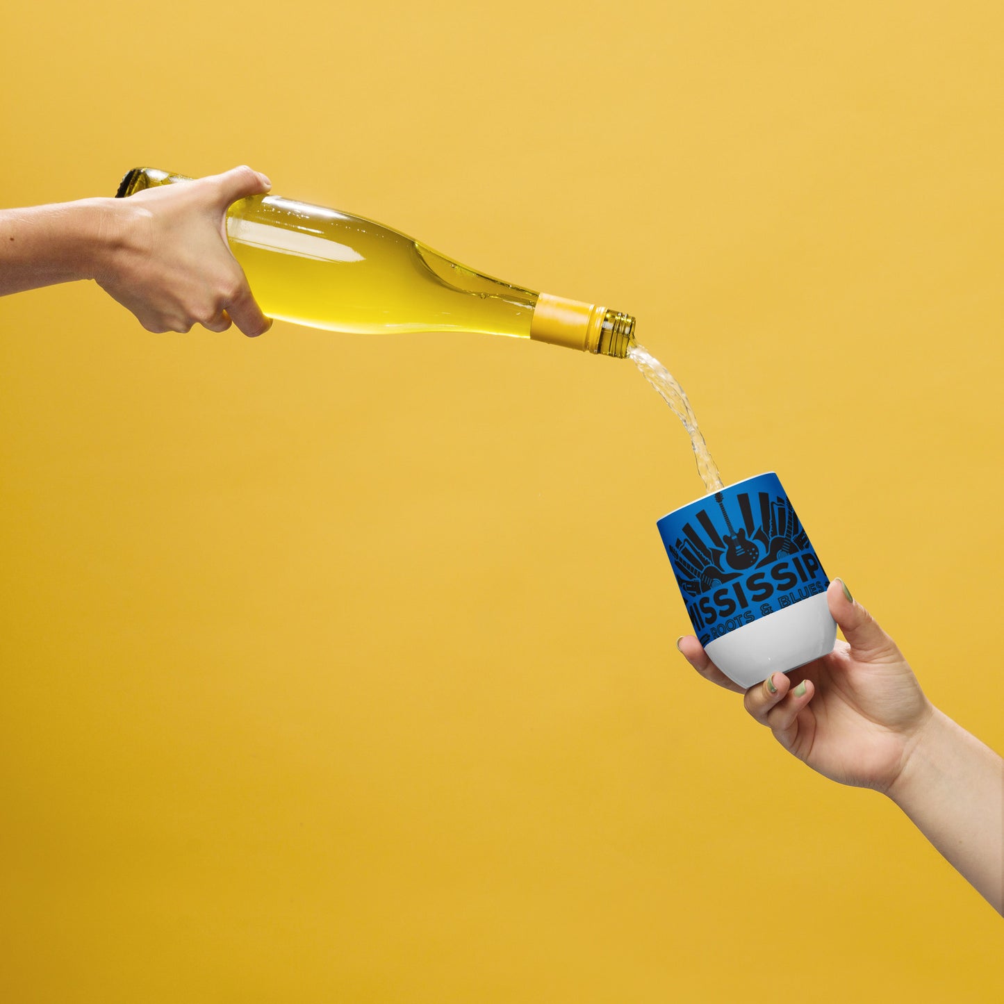 wine cup with blues logo and blue background having wine poured into it